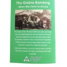 The back of a "Gretna Bombing" book, which features a black and white photo of a bomb damaged house.