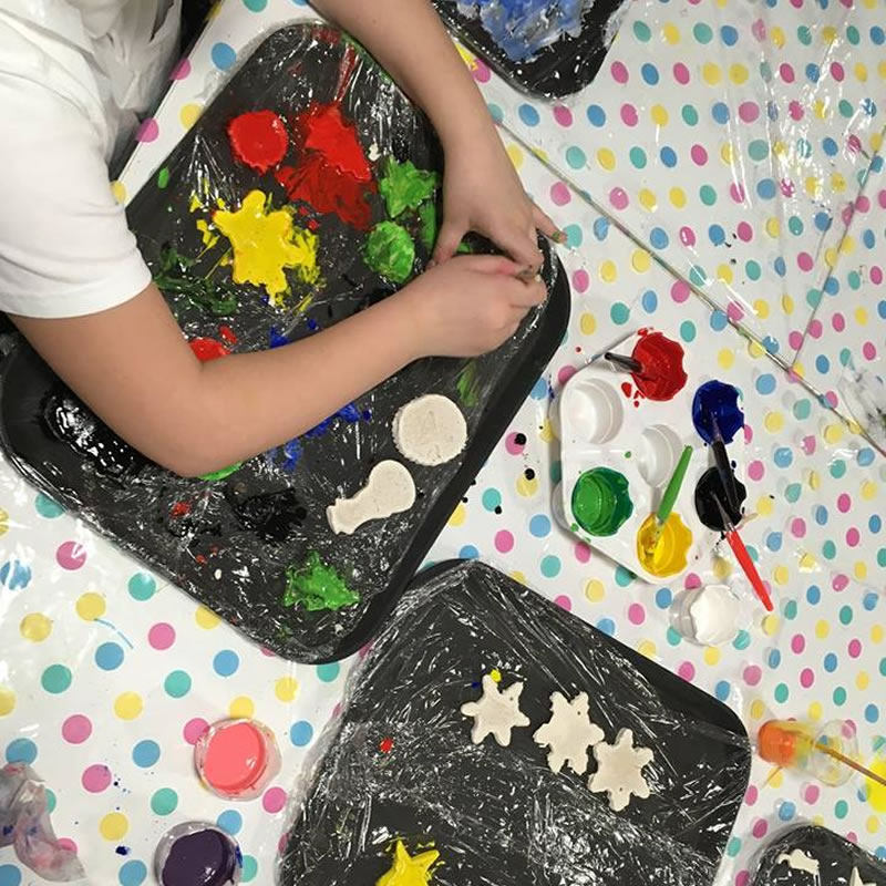 A child painting.