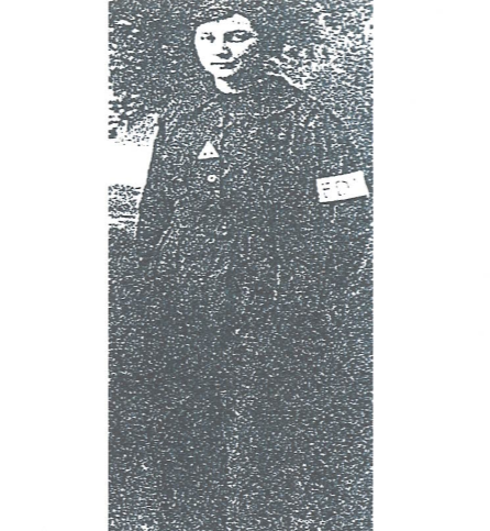 Victoria Robertson in munition workers uniform.