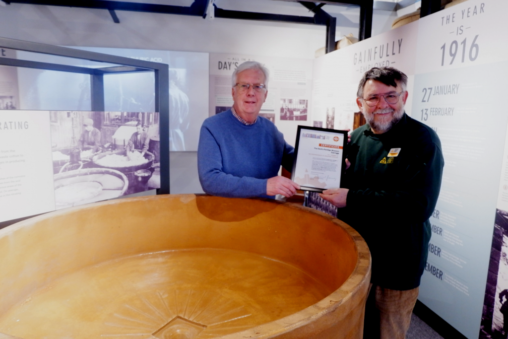 Jonathan from ERIH presents Museum Chairman Richard Brodie with a certificate of membership for display within the Museum.