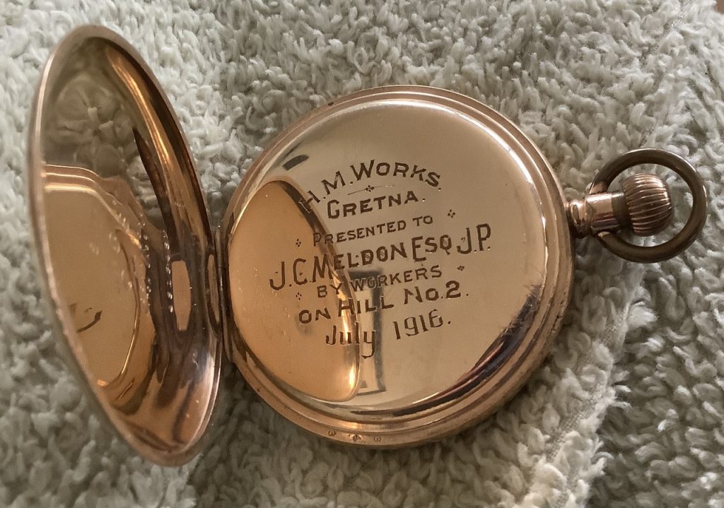 Fob watch with an inscription which reads "H.M. Works. Gretna. Presented to J.C Meldon Esq JP. By workers on Hill No. 2 July 1916."