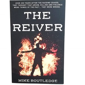 Front cover of "The Reiver" by Mike Routledge with a photo of a human silhouetted by fire.