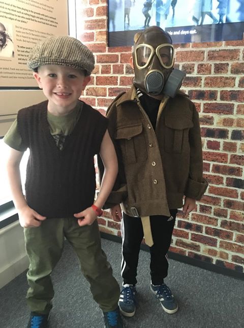 Some children dressing up at The Devil's Porridge Museum.