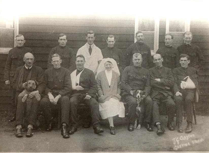 Gretna Works Hospital Staff. There are also two dogs in the photo.
