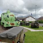 Sir James, the fireless locomotive and some military vehicles outside The Devil's Porridge Museum.
