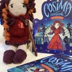 A poster for the book "Cosima Unfortunate Steals a Star" with a knitted version of the book's main character and her stick.