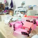 Some handmade soap made by the Scotia Crafters on display on a table.