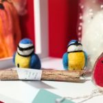 Three needle felted birds made by the Scotia Crafters.