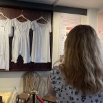 A young person looking at The Devil's Porridge Museum's Gretna Girls bedroom.