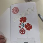 A card with some flowers and a 2024 calendar on.