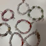 A collection of handmade bracelets.
