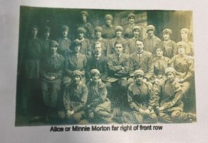 A group photo of H. M. Factory Gretna muntions workers with Minnie and Alice Morton in.
