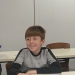 A happy young person at Mostly Ghostly's family friendly storytelling workshop in The Devil's Porridge Museum.