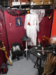 Halloween decorations arranged to create a witches room.