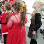 Children in festive clothing at The Devil's Porridge Museum's Christmas party.