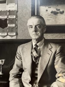 Tom Bonsor in a suit.