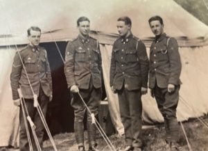 Four people in military uniforms, one of which is Tom Bonsor.