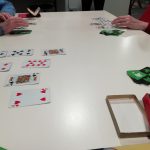 Playing cards on the table, which are being used by the museum's Cordite Club.