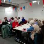 Cordite Club playing card bingo in The Devil's Porridge Museum's education room.