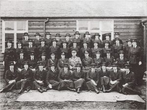 Some of H.M. Factory Gretna's Women's Police Force in front of one of the hostels.