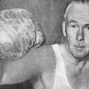 Robert Affleck wearing boxing gloves.