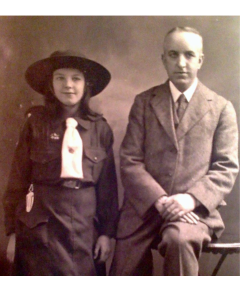 Robert Wotherspoon wearing a suit stood next a girl, who is most probably his daughter. This is an archive photo from the past.