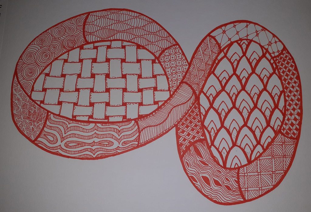 A red Zentangle drawing. This is drawing is a figure of eight shape with a mixture of different patterns inside it.