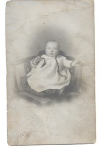 Margaret Orman Jnr or Peggy as a baby. This is a black and white photo from the past.
