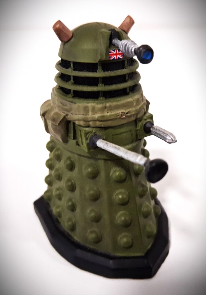 A kaki green World War Two themed Ironside Dalek figure.